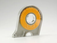 Photo of Tamiya Masking Tape 6mm (87030) with plastic dispenser and built-in cutter for model painting.
