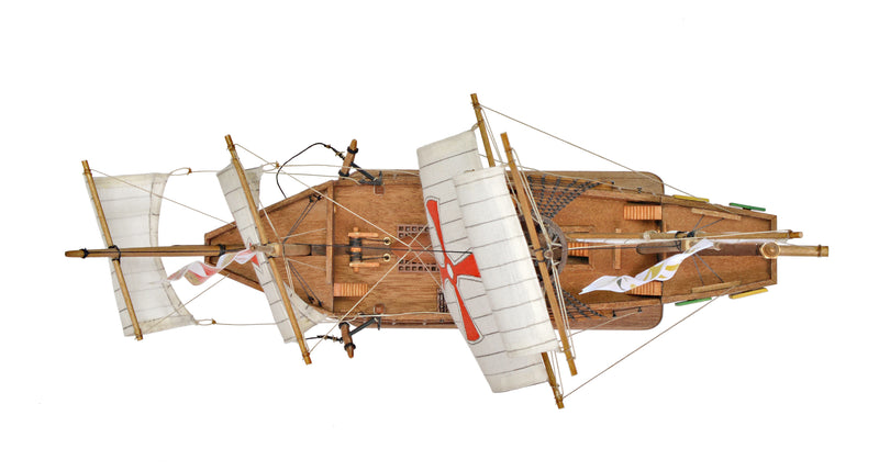 Photo of Amati First Step Model Santa Maria 1:100 scale wooden ship kit showing assembled model with wooden hull and sails.