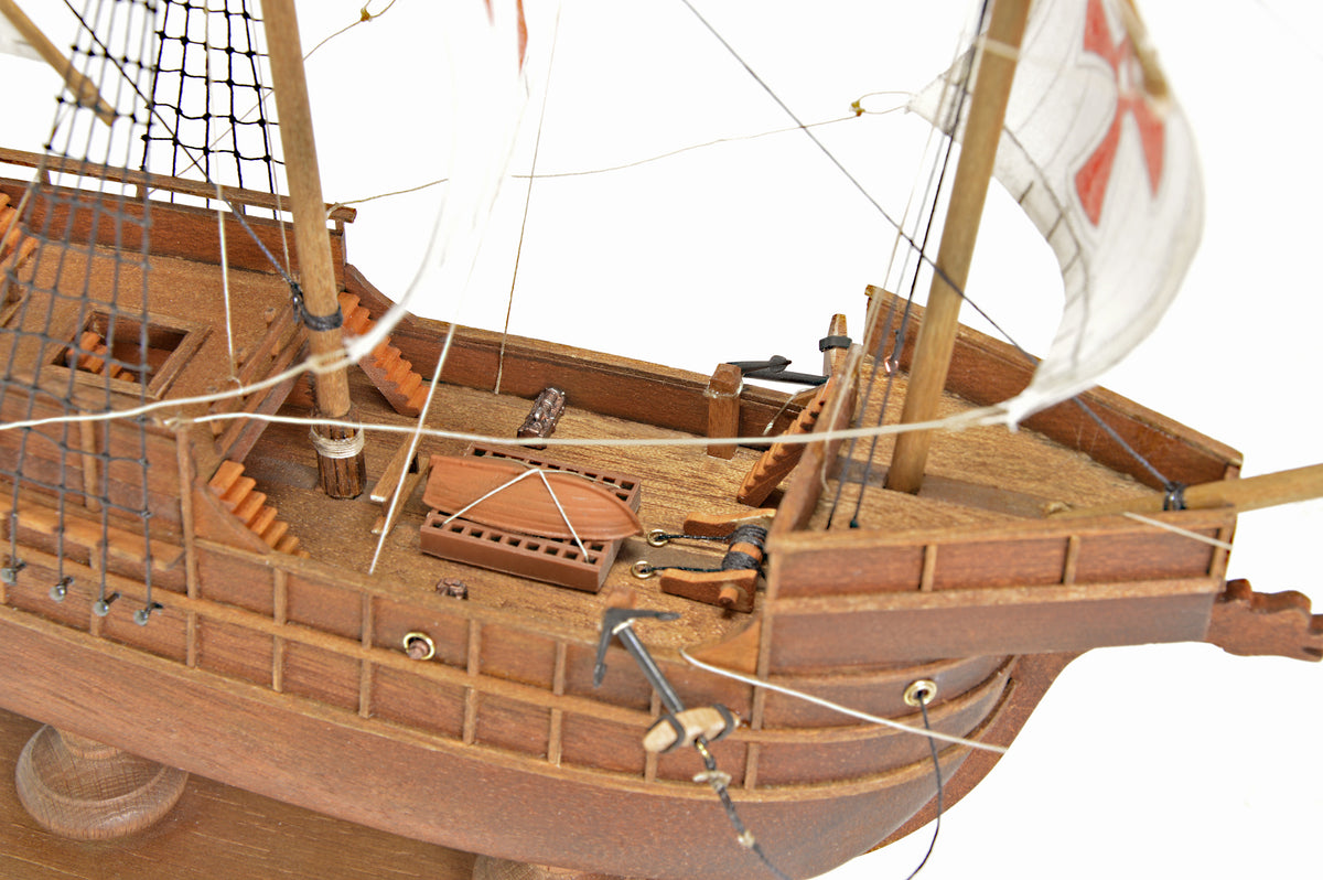 Photo of Amati First Step Model Santa Maria 1:100 scale wooden ship kit showing assembled model with wooden hull and sails.