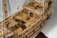 Photo of Amati Revenge wooden ship model kit 1:64 scale showing detailed 16th-century English galleon with sails, rigging, and wooden hull.