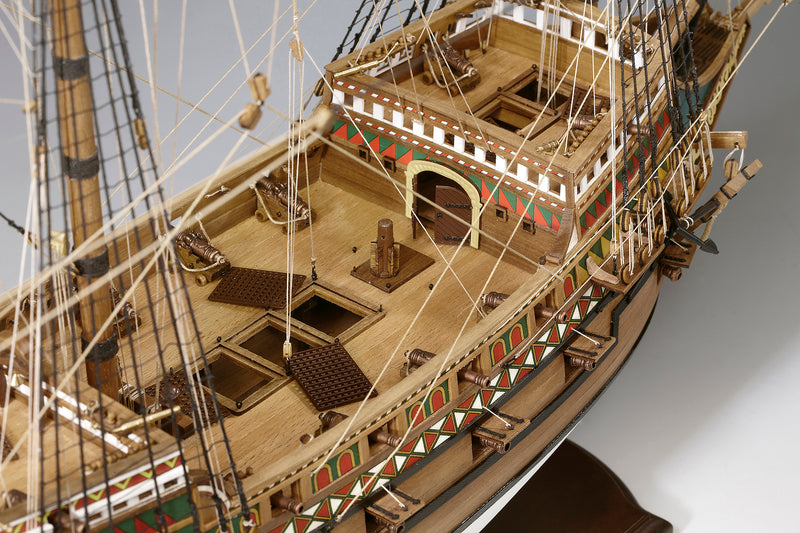 Photo of Amati Revenge wooden ship model kit 1:64 scale showing detailed 16th-century English galleon with sails, rigging, and wooden hull.