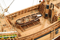 Image displaying the Amati Mayflower wooden model kit, featuring the detailed components and tools for assembling a historically accurate replica of the 17th-century Pilgrim ship, showcasing intricate craftsmanship and authentic design.