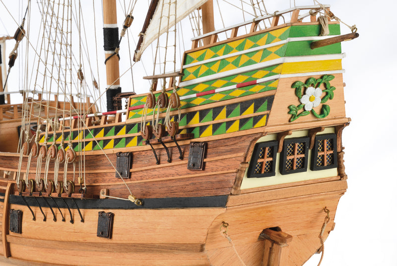 Image displaying the Amati Mayflower wooden model kit, featuring the detailed components and tools for assembling a historically accurate replica of the 17th-century Pilgrim ship, showcasing intricate craftsmanship and authentic design.