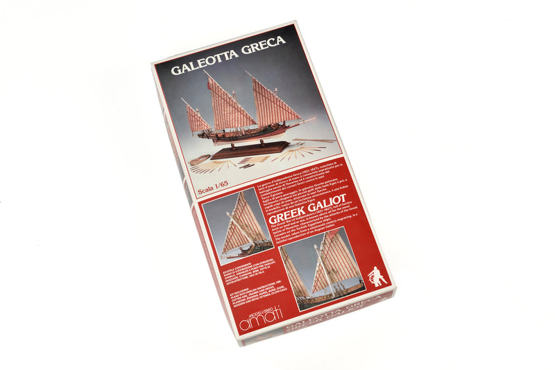 Photo of Amati Greek Galley 1:65 wooden model ship kit with sails and wooden base, depicting a historic Greek warship from the War of Independence.