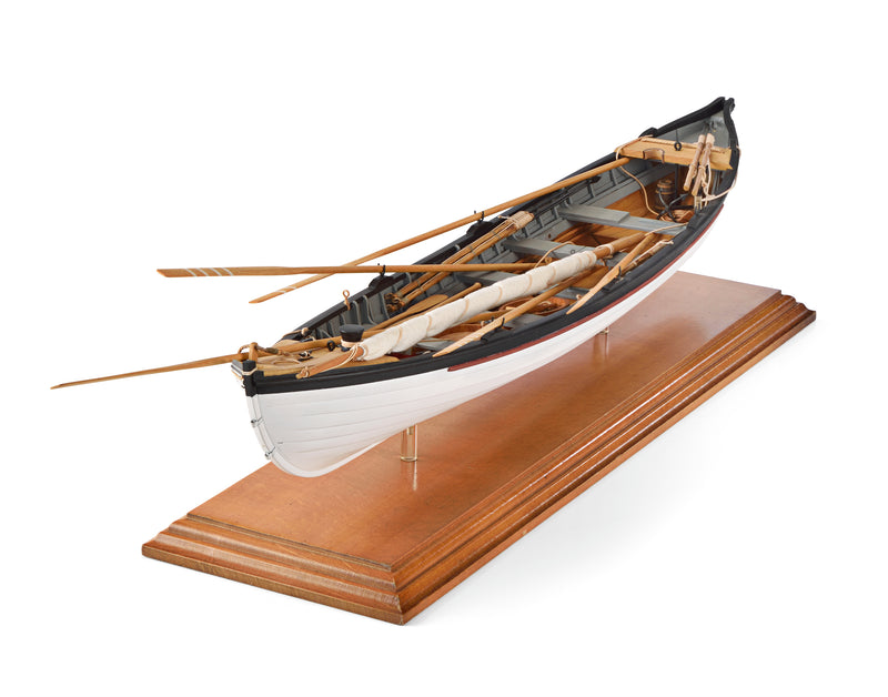 Photo of the Amati 1:16 scale New Bedford Whaleboat model kit showing detailed wooden construction and historical maritime design.
