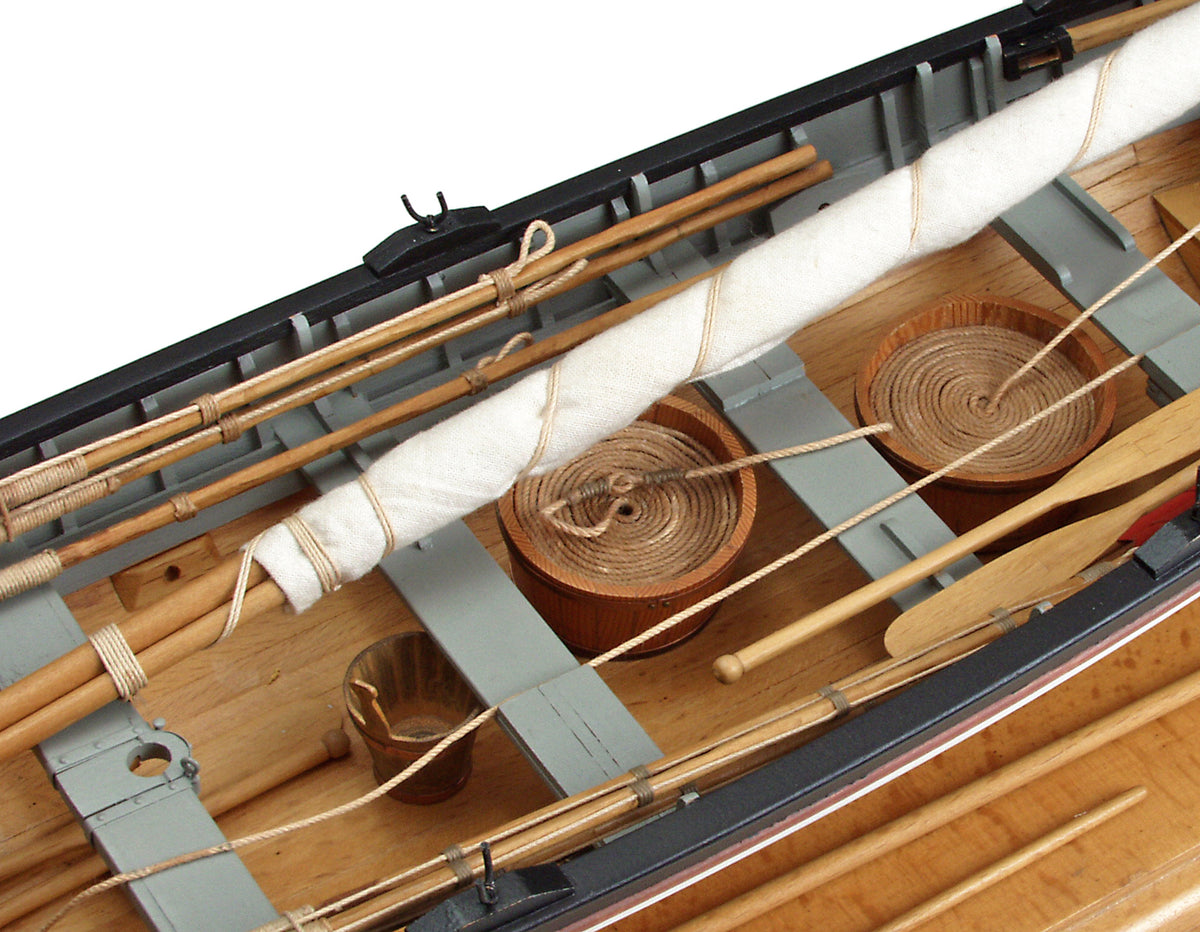 Photo of the Amati 1:16 scale New Bedford Whaleboat model kit showing detailed wooden construction and historical maritime design.