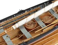 Photo of the Amati 1:16 scale New Bedford Whaleboat model kit showing detailed wooden construction and historical maritime design.