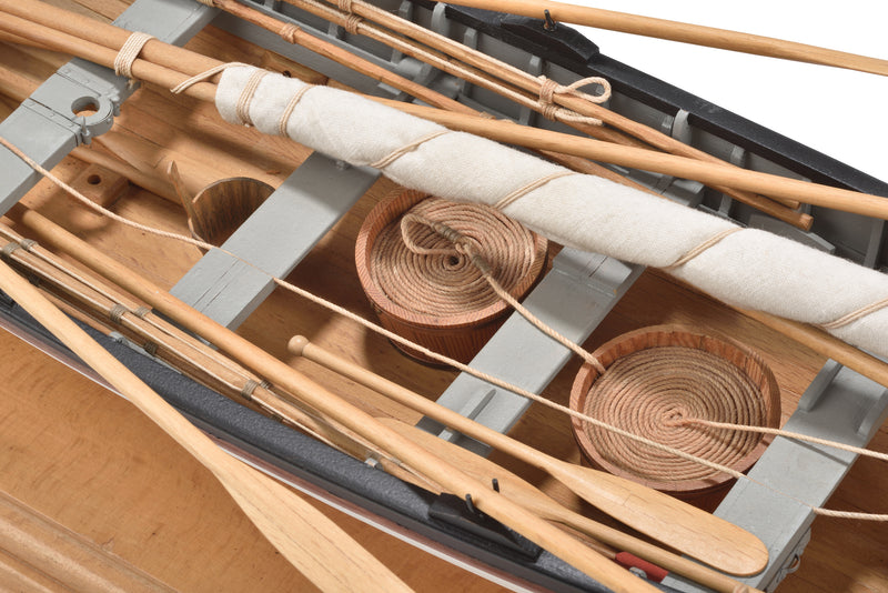 Photo of the Amati 1:16 scale New Bedford Whaleboat model kit showing detailed wooden construction and historical maritime design.