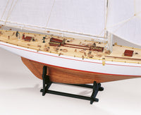 Photo of Amati Rainbow 1:80 scale wooden model yacht kit with sails, tools, and brass fittings