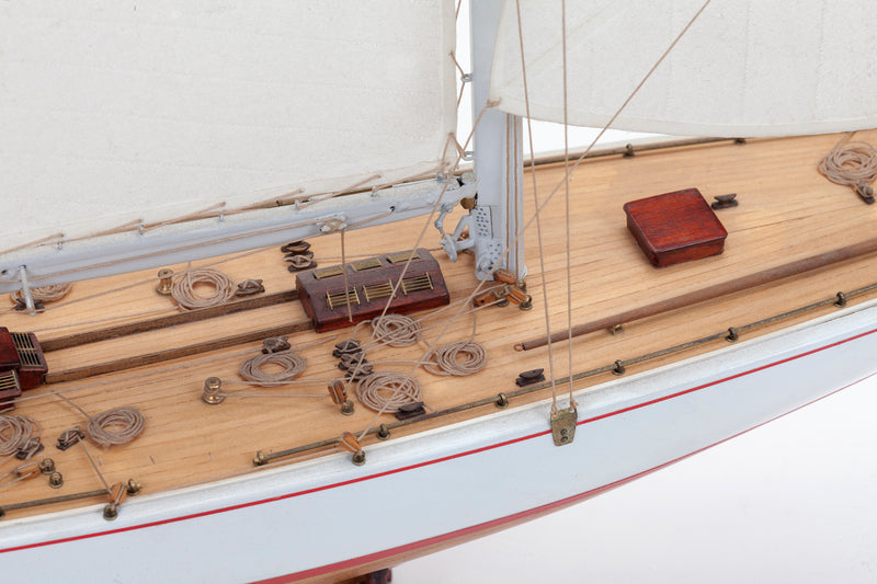 Photo of Amati Rainbow 1:80 scale wooden model yacht kit with sails, tools, and brass fittings
