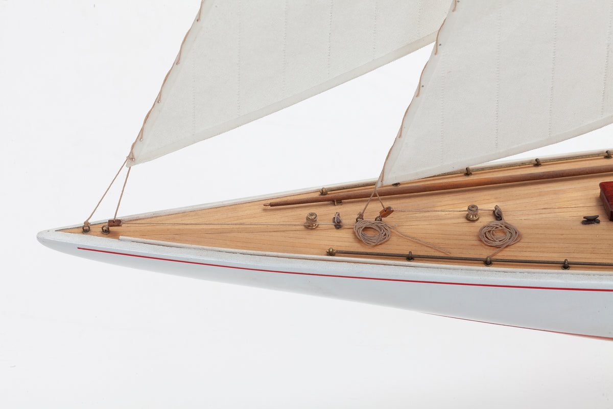 Photo of Amati Rainbow 1:80 scale wooden model yacht kit with sails, tools, and brass fittings