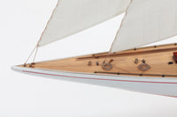 Photo of Amati Rainbow 1:80 scale wooden model yacht kit with sails, tools, and brass fittings