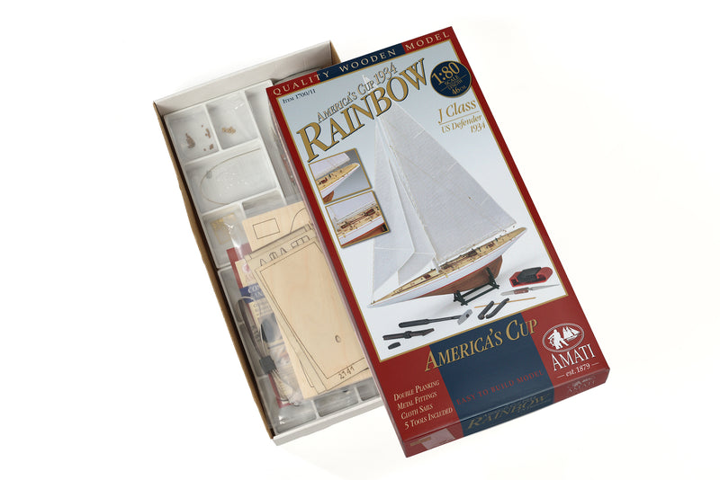 Photo of Amati Rainbow 1:80 scale wooden model yacht kit with sails, tools, and brass fittings
