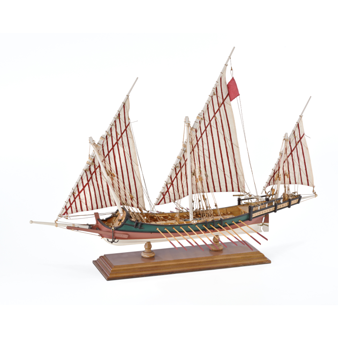Photo of Amati Greek Galley 1:65 wooden model ship kit with sails and wooden base, depicting a historic Greek warship from the War of Independence.