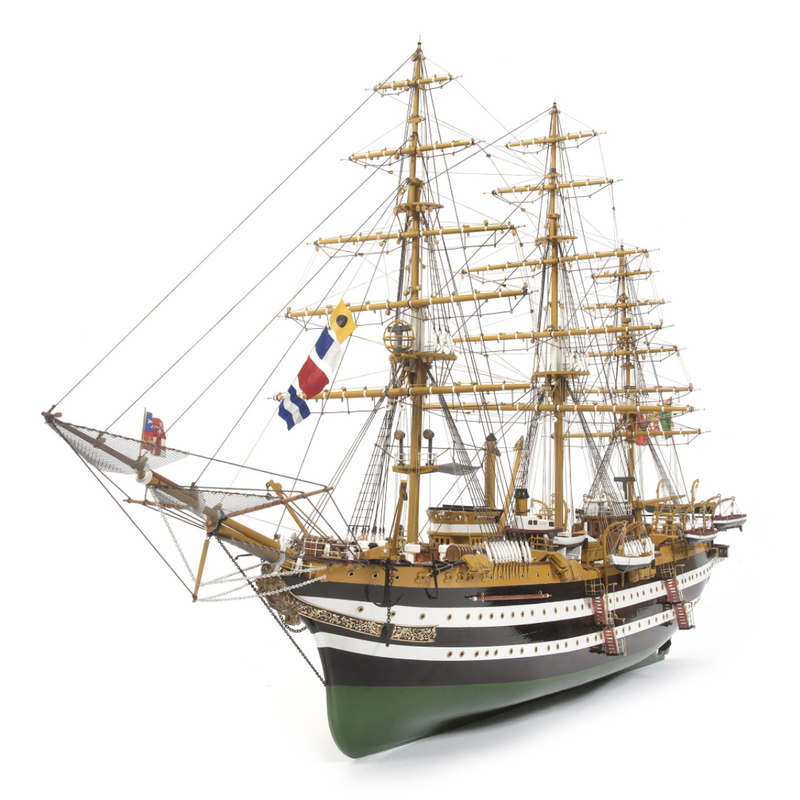 Photo of OcCre Amerigo Vespucci 1:100 wooden model ship kit without sails, showing detailed hull and brass photo-etch parts.