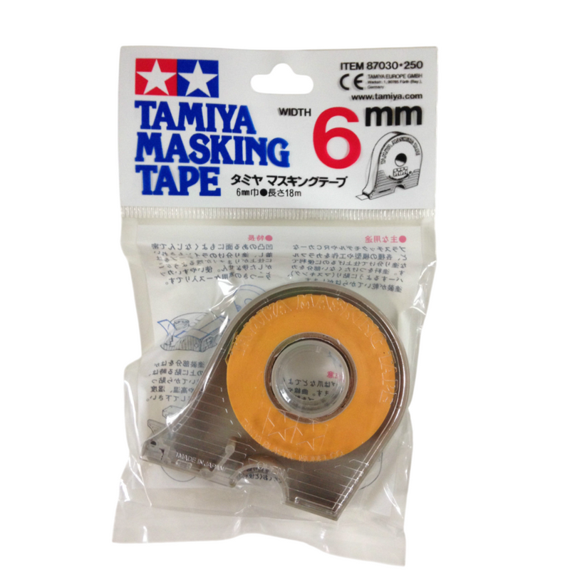 Photo of Tamiya Masking Tape 6mm (87030) with plastic dispenser and built-in cutter for model painting.