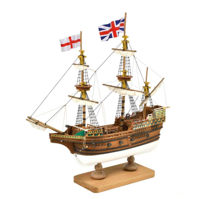 Model ship with two flags on a white background