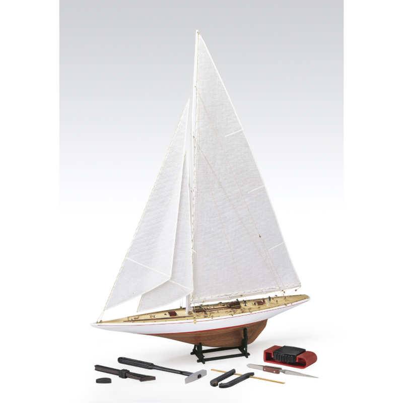 Photo of Amati Rainbow 1:80 scale wooden model yacht kit with sails, tools, and brass fittings
