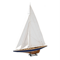 Image showcasing Amati's America's Cup 1934 Endeavour wooden model kit, depicting a detailed and authentic replica of the historic racing yacht with intricate craftsmanship and elegant design elements.