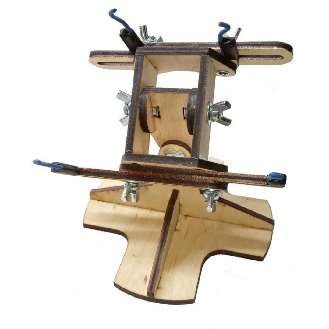 Photo of LMG BB-05 armored vehicle model assembly jig with cross base