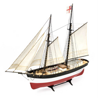 Image of Amati's Hunter Q-Ship wooden model kit, showcasing the detailed components and assembly materials for creating a scale replica of the World War I decoy vessel, with intricate designs and authentic historical features.