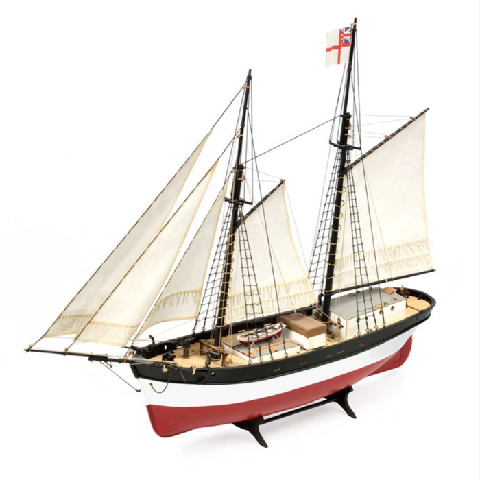 Image of Amati's Hunter Q-Ship wooden model kit, showcasing the detailed components and assembly materials for creating a scale replica of the World War I decoy vessel, with intricate designs and authentic historical features.