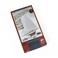 Photo of Amati Rainbow 1:80 scale wooden model yacht kit with sails, tools, and brass fittings