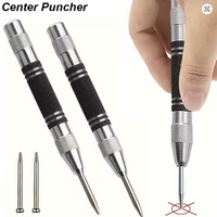 Photo of automatic center punch with hardened chrome vanadium tip and spring-loaded mechanism for metal and wood marking