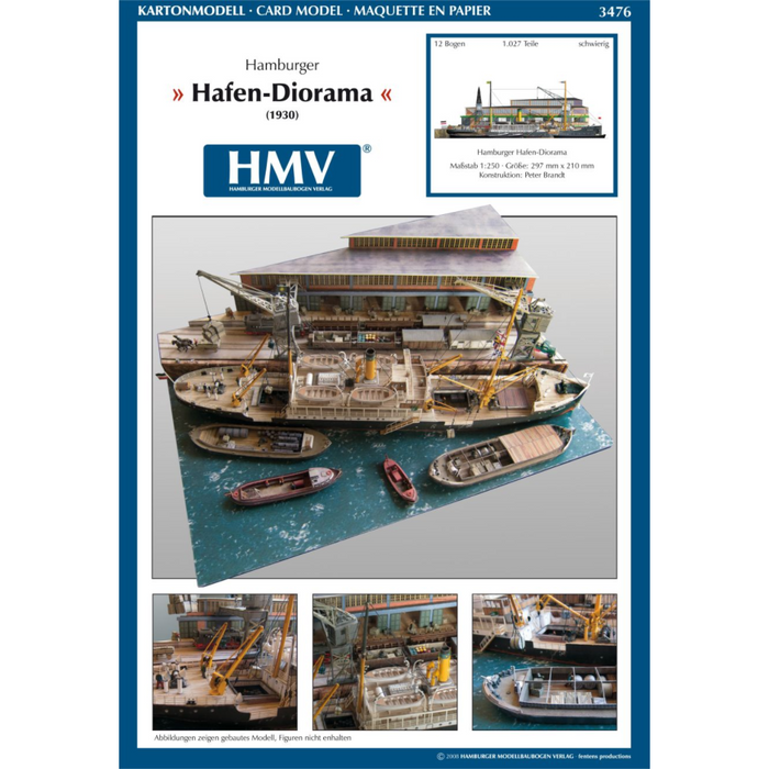 Photo of Harbor Diorama Hamburg 1:250 card model kit by HMV showing the weathered steamer Schwan and detailed 1930s harbor scene with cranes, vehicles, and warehouse.