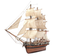 Photo of OcCre Essex 1:60 scale wooden model ship kit with detailed rigging and historical design