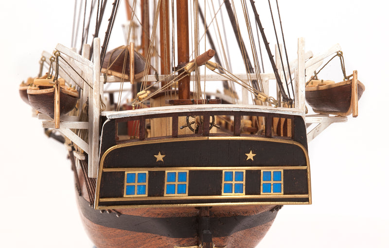 Photo of OcCre Essex 1:60 scale wooden model ship kit with detailed rigging and historical design