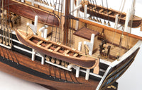 Photo of OcCre Essex 1:60 scale wooden model ship kit with detailed rigging and historical design