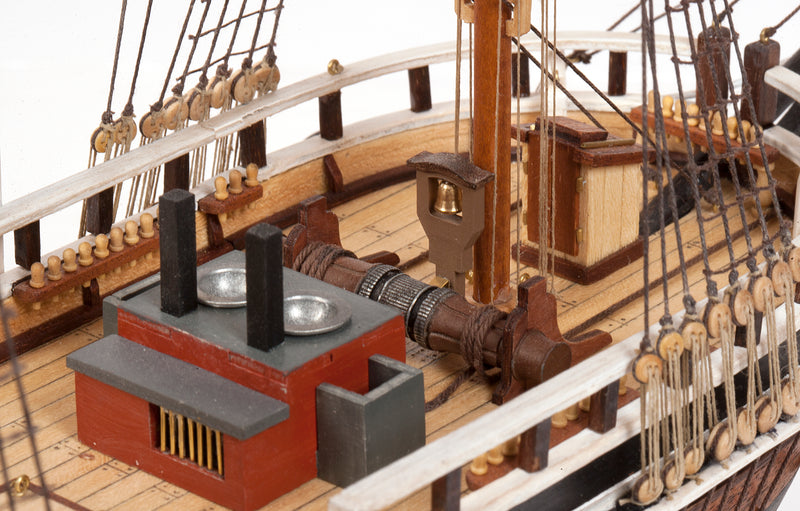 Photo of OcCre Essex 1:60 scale wooden model ship kit with detailed rigging and historical design