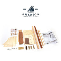 Photo of America 1851 yacht model kit 1:75 scale by OcCre showing detailed wooden hull and rigging