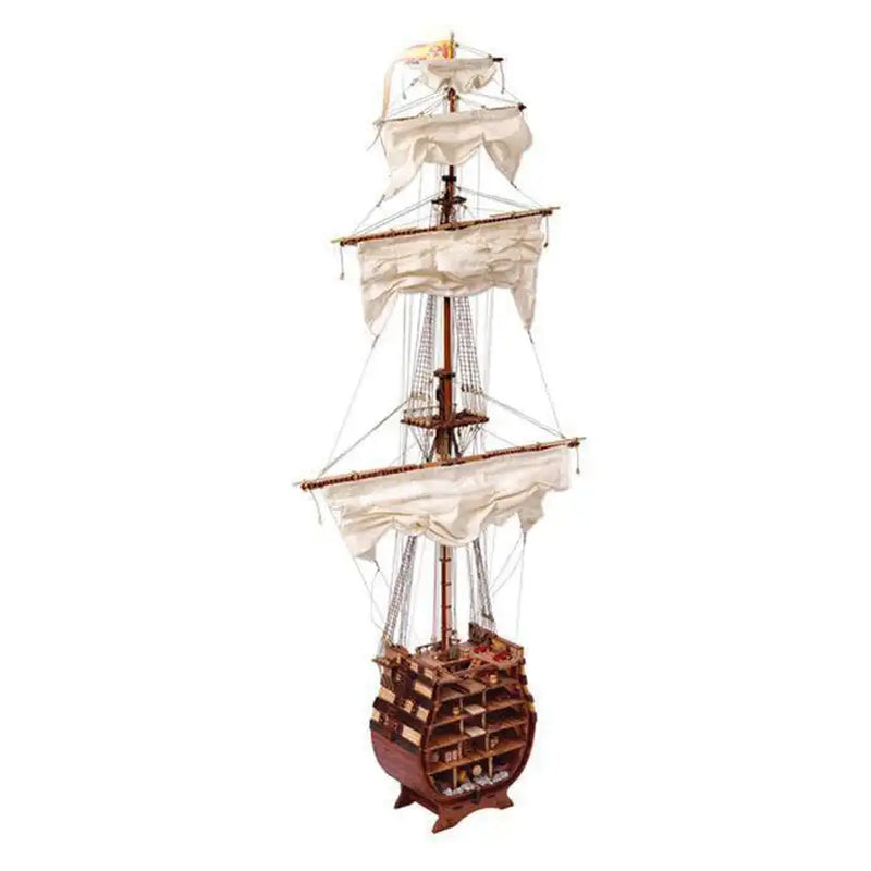 Photo of the Santísima Trinidad cross-section model kit by OcCre in 1/90 scale, showcasing detailed inner ship structure and mainmast elements.