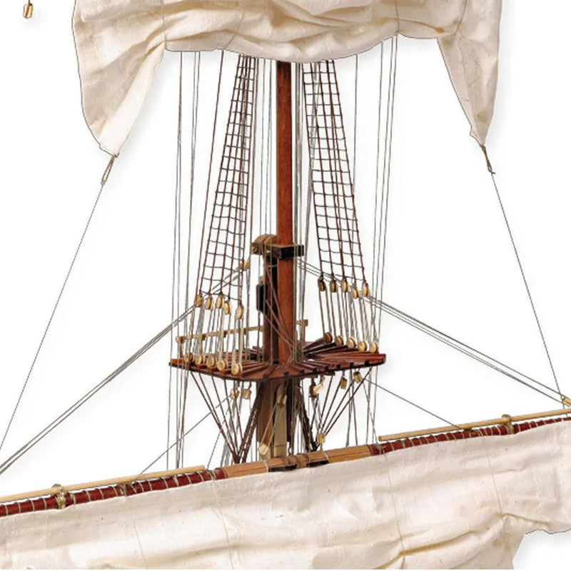 Photo of the Santísima Trinidad cross-section model kit by OcCre in 1/90 scale, showcasing detailed inner ship structure and mainmast elements.