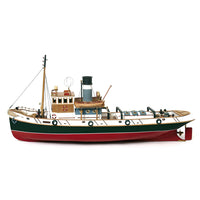 Photo of the Ulises Tug Boat Model Kit (1:30 Scale) by OcCre (61001), a detailed wooden and metal ship model featuring a steel hull, wooden crew areas, and intricate maritime details.