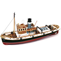 Photo of the Ulises Tug Boat Model Kit (1:30 Scale) by OcCre (61001), a detailed wooden and metal ship model featuring a steel hull, wooden crew areas, and intricate maritime details.