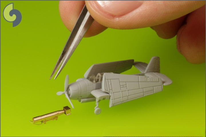 Photo of 1:350 US Navy Mark 13 Airborne Torpedoes with trolleys, turned brass construction, wooden breakaway nose and tail protection, and photo-etched parts.