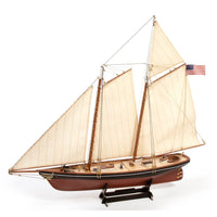 Photo of America 1851 yacht model kit 1:75 scale by OcCre showing detailed wooden hull and rigging