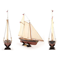 Photo of America 1851 yacht model kit 1:75 scale by OcCre showing detailed wooden hull and rigging