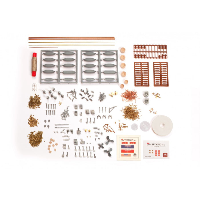 Photo of Accessories for Titanic 2025 Edition from Amati (B1837) including detailed model ship parts like railings, lifeboats, and brass fittings.