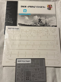 Model kit parts kit for the German battleship DKM Prinz Eugen, including the main instruction booklet, a sheet of cut-out templates, and a sheet of small metal decals, all branded with the 'Moreland' logo.