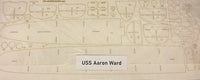 A flat printed template sheet for a model ship labeled 'USS Aaron Ward,' showing many outlined compartments and fittings on a light beige background.