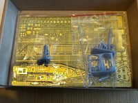 Photo of photo-etched brass detail set for German U-Boat Type XXIII in 1:72 scale, showing deck, railings, and conning tower parts.