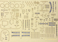 A beige model kit decal sheet featuring blue and gray printed details for a ship, with the text 'USS AARON WARD' in the bottom right corner.