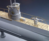 Photo of photo-etched brass parts upgrade set for German U-Boat Type IIB 1:144 scale by Revell and ICM, featuring railings, ladders, and deck details.