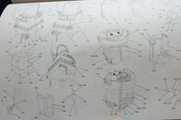 A printed technical schematic sheet showing multiple black-and-white exploded line drawings of cylindrical and rectangular mechanical components with numbered callouts on a white background.