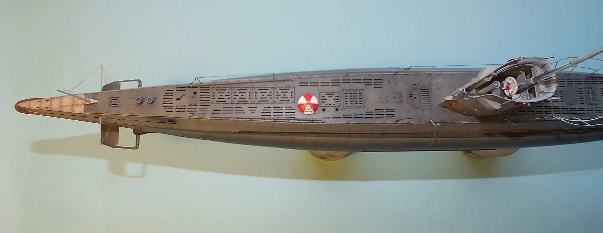 Photo of 1:72 scale photo-etched brass upgrade set for German U-Boat Type IIA, showing deck and conning tower detailing parts.