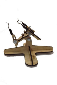 Photo of LMG BB-05 armored vehicle model assembly jig with cross base